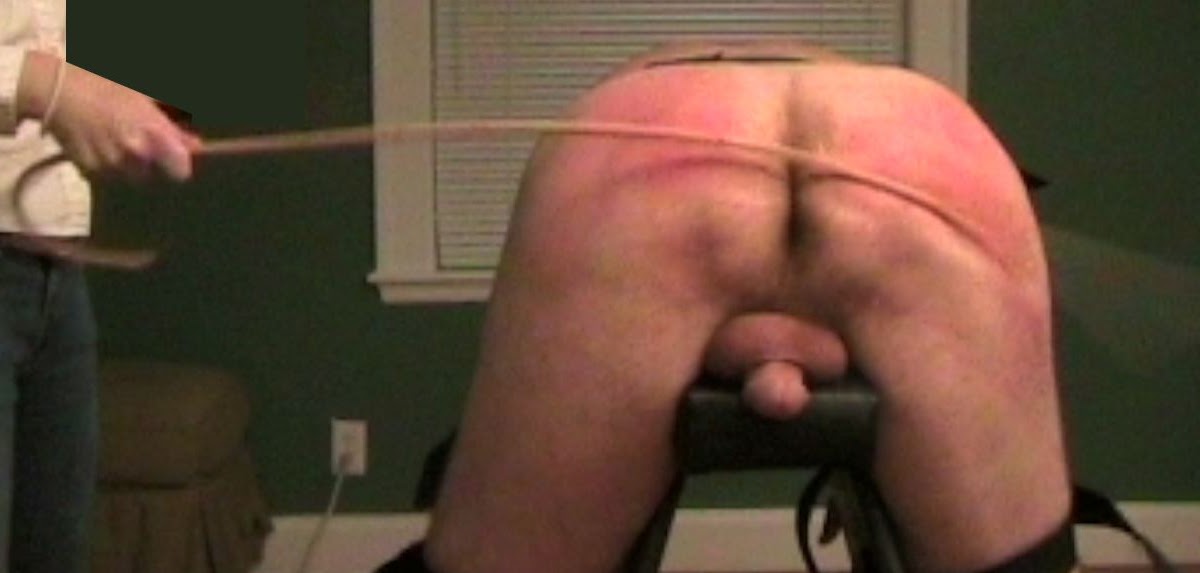 Spanking My Husband caning away an erect
